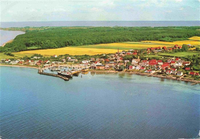 Lohals Langeland DK Hafen Boote Kuesteort Felder Wohnhaeuser Wald Ostsee