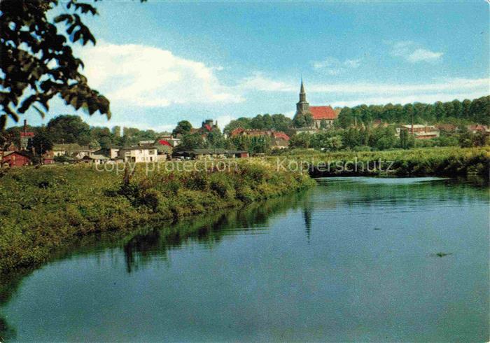 Kellinghusen Stoer Stadtansicht Kirche Fluss Spiegelung Baeume Sommer