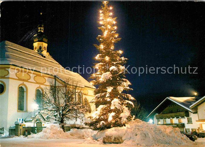 Lermoos Tirol Kirche und Tannenbaum