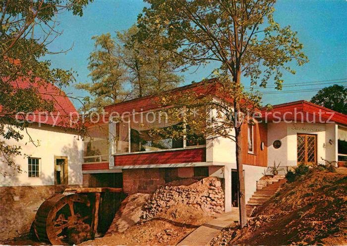 Bad Iburg Cafe Schlossmuehle Haupteingang mit Muehlrad