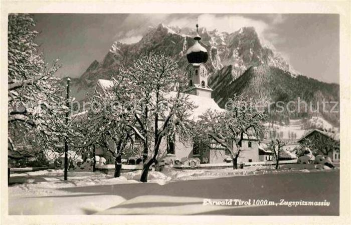 Ehrwald Tirol Ortsansicht mit Kirche Winterpanorama Zugspitzmassiv Wettersteinge
