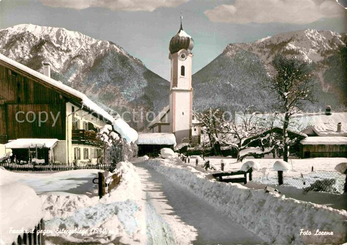 Farchant Ortsmotiv mit Kirche Winterpanorama gegen Estergebirge