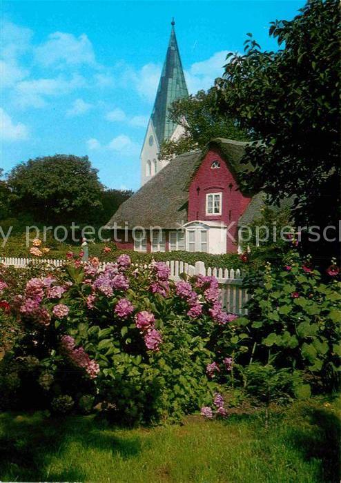 Nebel Amrum Friesenhaus und St Clemenskirche
