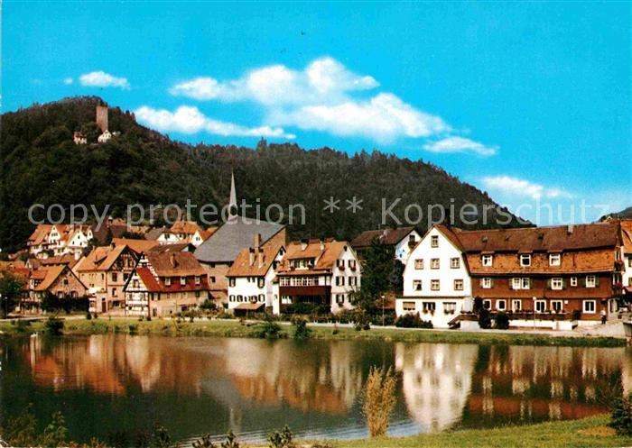 Bad Liebenzell Stadtsee mit Hotel Loewen St Liobakirche und Burg