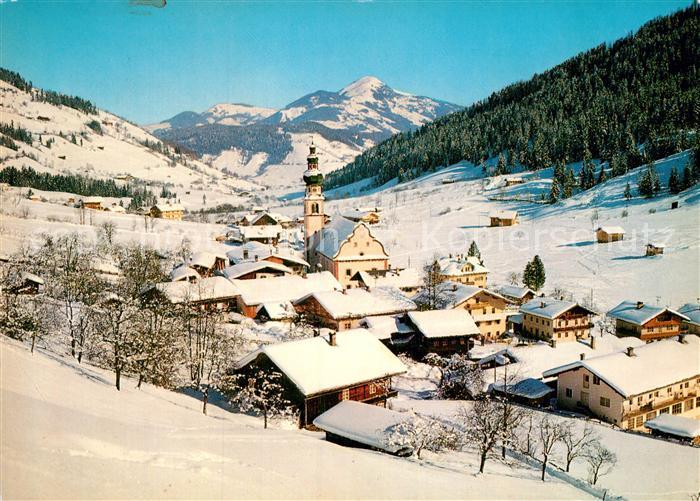 Oberau Wildschoenau Tirol Ortsansicht mit Kirche Winterpanorama Alpen