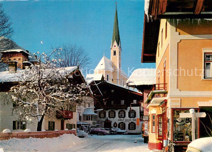Kirchberg Tirol Ortsmotiv mit Kirche im Winter
