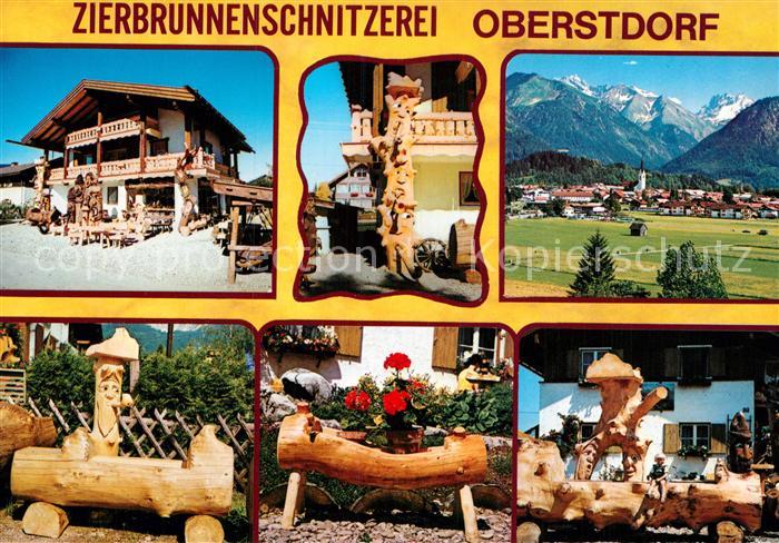 Oberstdorf Zierbrunnenschnitzerei Handwerk Gesamtansicht mit Alpenpanorama