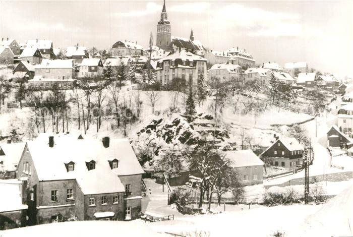 Schneeberg Erzgebirge Ortsansicht mit Kirche im Winter