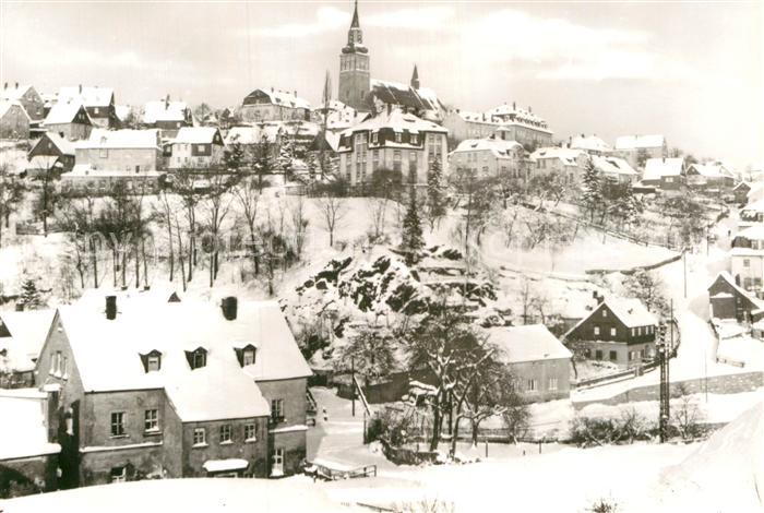 Schneeberg Erzgebirge Ortsansicht mit Kirche im Winter
