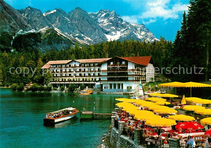 Eibsee Eibseehotel und Eibseepavillon Terrasse mit Anlegestelle Zugspitze