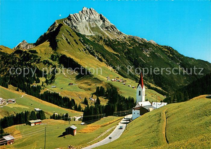 Warth Vorarlberg mit Kirche und Biberkopf