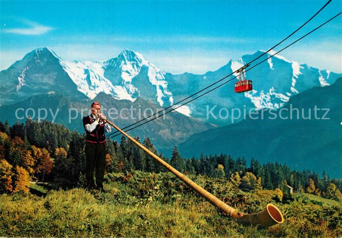Alphorn Alphornblaeser Eiger Moench Jungfrau Seilbahn