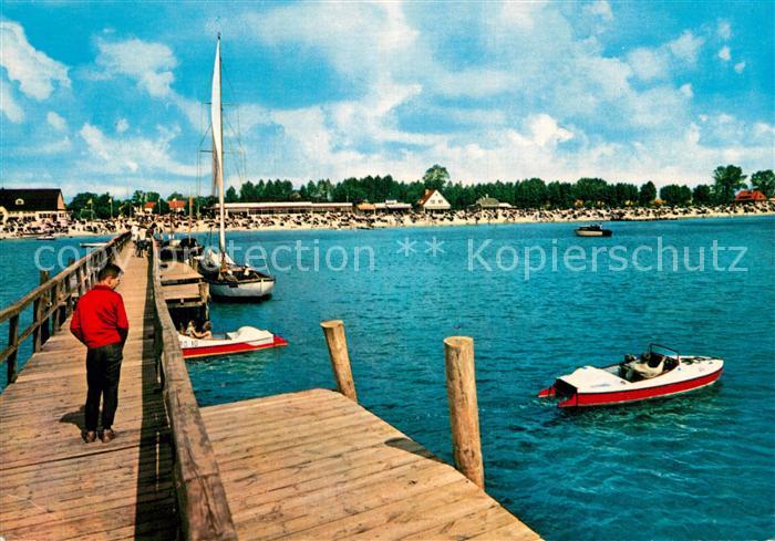Groemitz Ostseebad Seebruecke und Strand