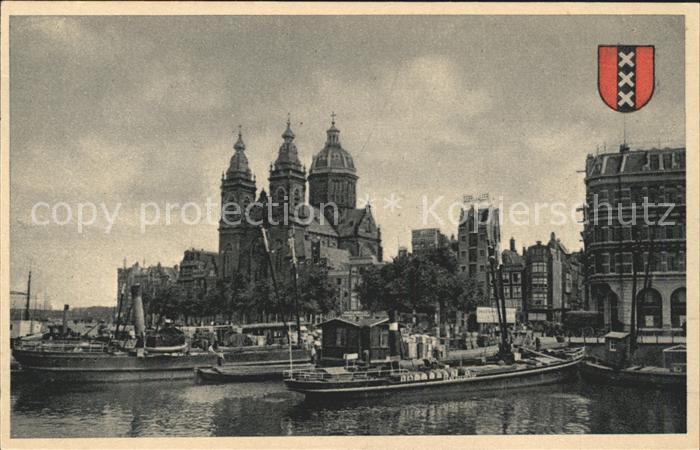 Amsterdam Niederlande PH Kade met St Nicolaaskerk Schiff Wappen