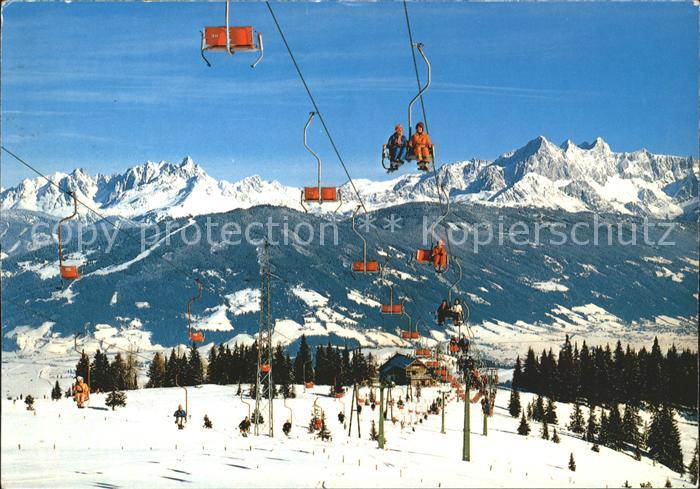 Flachau Wintersportzentrum Blick zur Bischofsmuetze und Dachstein Sessellift