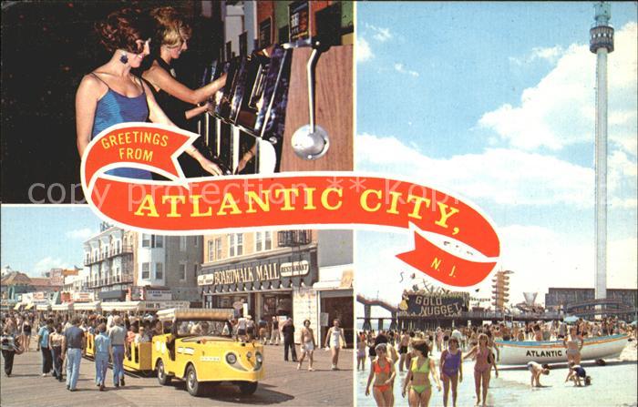 Atlantic City New Jersey Two girls slot machines Boardwaik tram car ride Beach