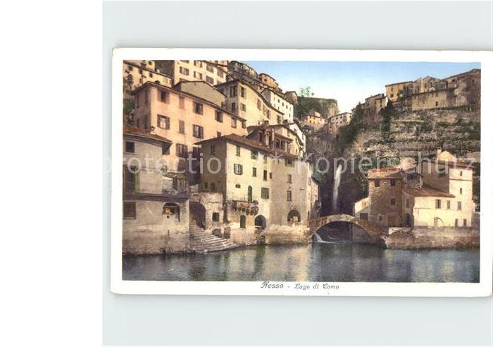 Nesso Lago di Como Alte Haeuser am Wasser Steinbruecke