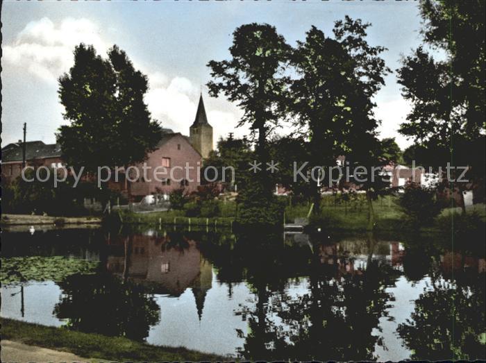 Niederkruechten Dorfweiher mit Kirche