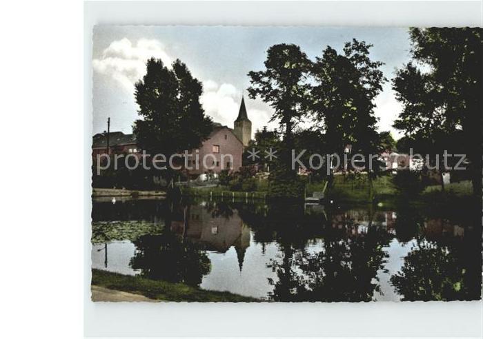 Niederkruechten Dorfweiher mit Kirche