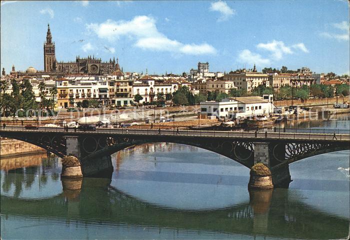 Sevilla Andalucia Puerto de Triana y vista parcial Catedral