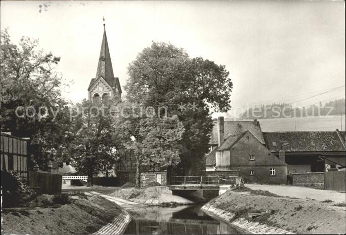 Stangerode Dorfpartie mit Kirche und Dorfbach
