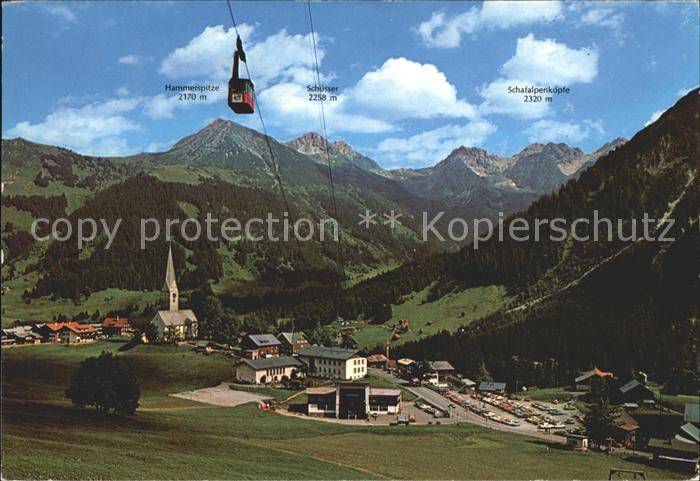 Mittelberg Kleinwalsertal Ortsansicht mit Kirche Walmendingerhorn Bahn Alpenpano