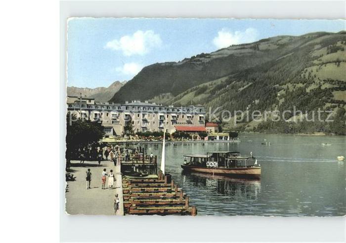 Zell See Seepromenade mit Grand Hotel Ausflugsschiff