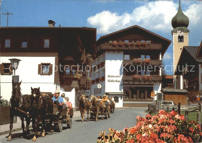 Westendorf Tirol Dorfpartie Pferdewagen Kirche