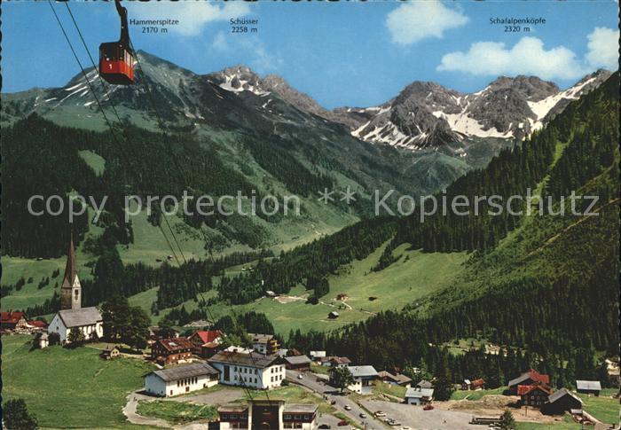 Mittelberg Kleinwalsertal mit Hammerspitze Schuesser und Schafalpenkoepfe Seilba