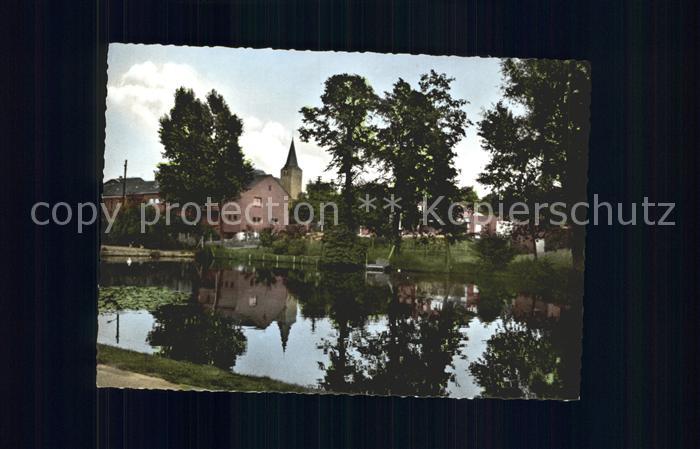 Niederkruechten Dorfweiher mit Kirche