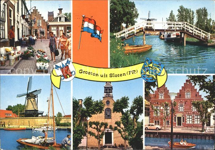 Sloten Sleat Windmuehel Strassenpartie Kirche