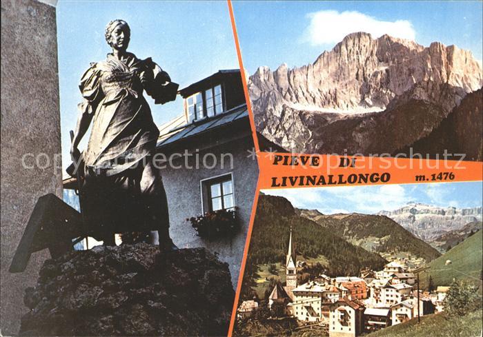 Pieve di Livinallongo Statue Bergmassiv Ortsansicht
