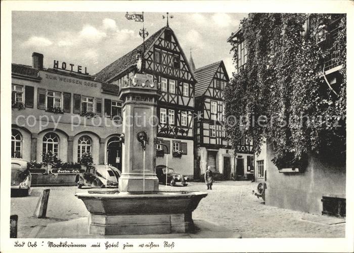 Bad Orb Marktbrunnen mit Hotel zum weissen Ross Fachwerkhaus