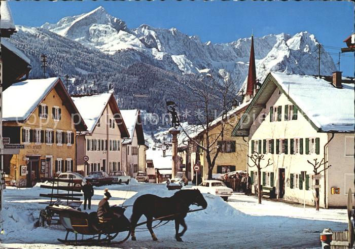 GARMISCH-PARTENKIRCHEN Bayern Floriansplatz mit Zugspitzgruppe Pferdeschlitten