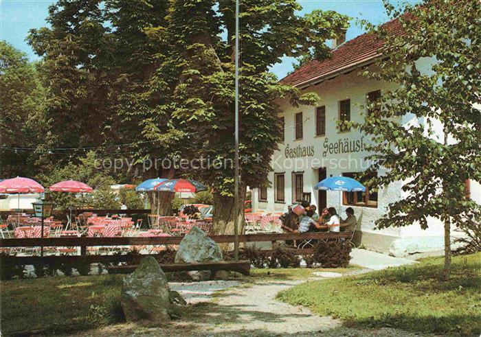 Stoettham Chieming Bayern Gasthaus Seehaeusl Biergarten Sonnenschirme Wald Chiem