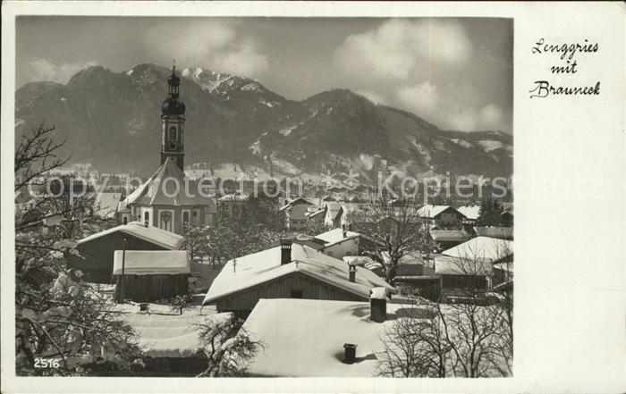 Lenggries Ortsansicht mit Kirche Brauneck Bayerische Voralpen Winter