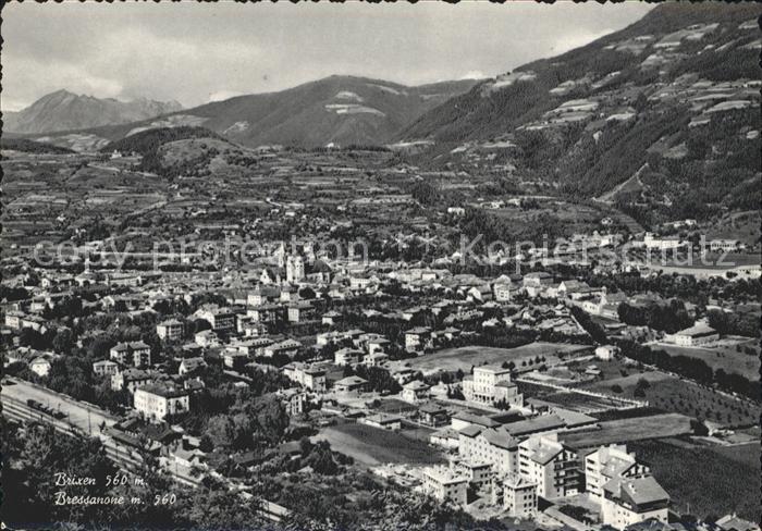 Brixen Suedtirol und Bressanone Fliegeraufnahme
