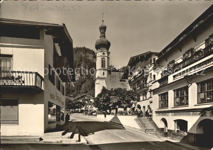 Reit Winkl Dorfstrasse mit Unterwirt und Kirche