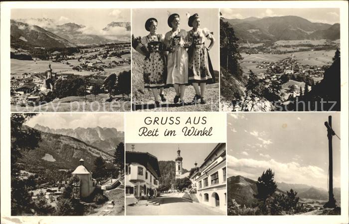 Reit Winkl Total Panorama Dorfpartie Gipfelkreuz Trachtenmaedchen