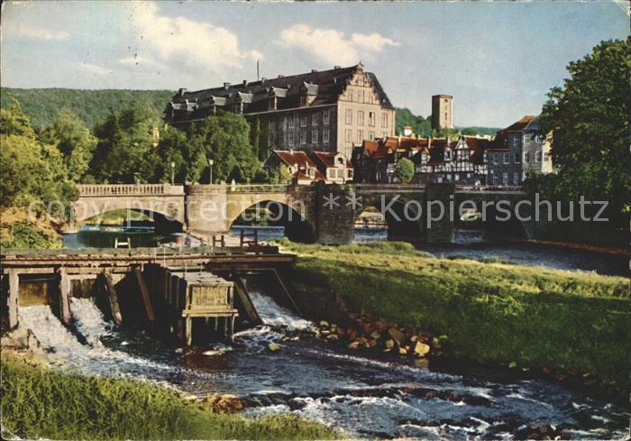 Hannoversch Muenden Alte Werrabruecke mit Werraschloss