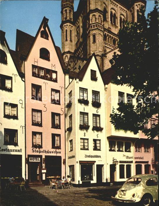 Koeln Rhein Altstadthaeuser mit Gross St Martin Fischmarkt