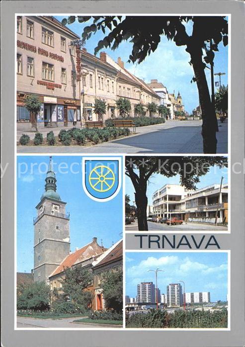 Trnava Strassenpartie Kirche Siedlung Hochhaeuser
