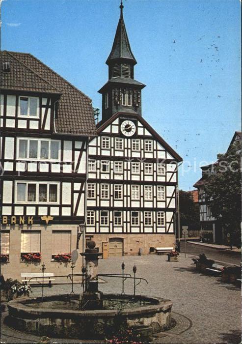 Allendorf Bad Sooden Rathaus mit Glockenspiel Marktbrunnen Fachwerkhaus