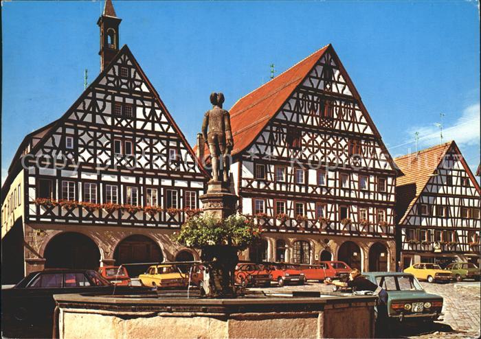 Dornstetten Wuerttemberg bei Freudenstadt Fachwerkhaeuser mit Brunnen