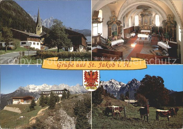 St Jakob Haus Ortspartie mit Kirche Berghaus Kuehe Alpen