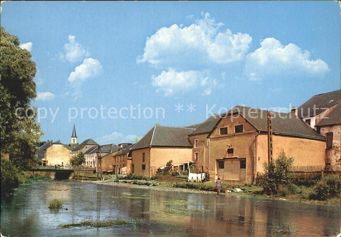 Martelange Haeuser am Fluss