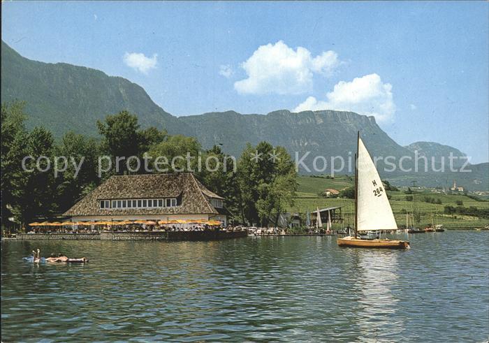 Kalterer See Suedtirol Restaurant am See Segelboot