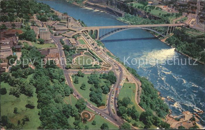 Niagara Falls Ontario Rainbow Bridge with Niagara Falls New York aerial view