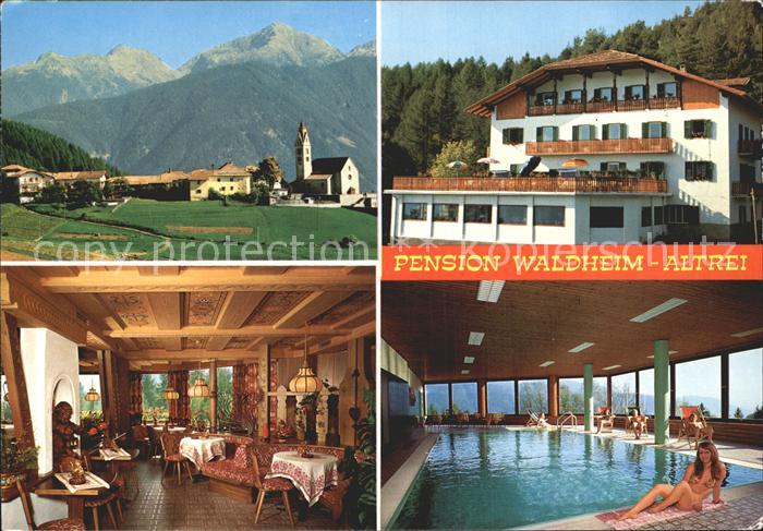Altrei Suedtirol Pension Restaurant Waldheim Hallenbad Ortsansicht Kirche Alpen