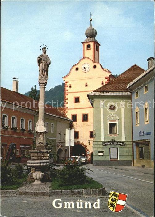 Gmuend Kaernten Dorfpartie mit Brunnen und Kirche